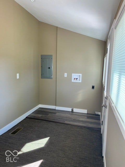 415 W Main, Greensburg, IN 47240 Neutral wall paint, sloped ceiling, laundry connections, and a white steel door with blinds