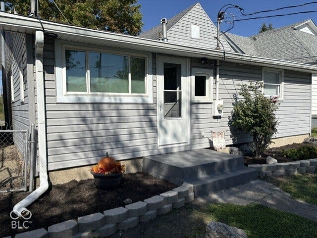 415 W Main, Greensburg, IN 47240 Light gray horizontal siding with white trim