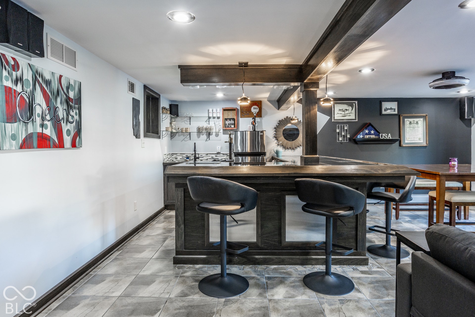 Huge wet bar-full-size refrigerator stays!