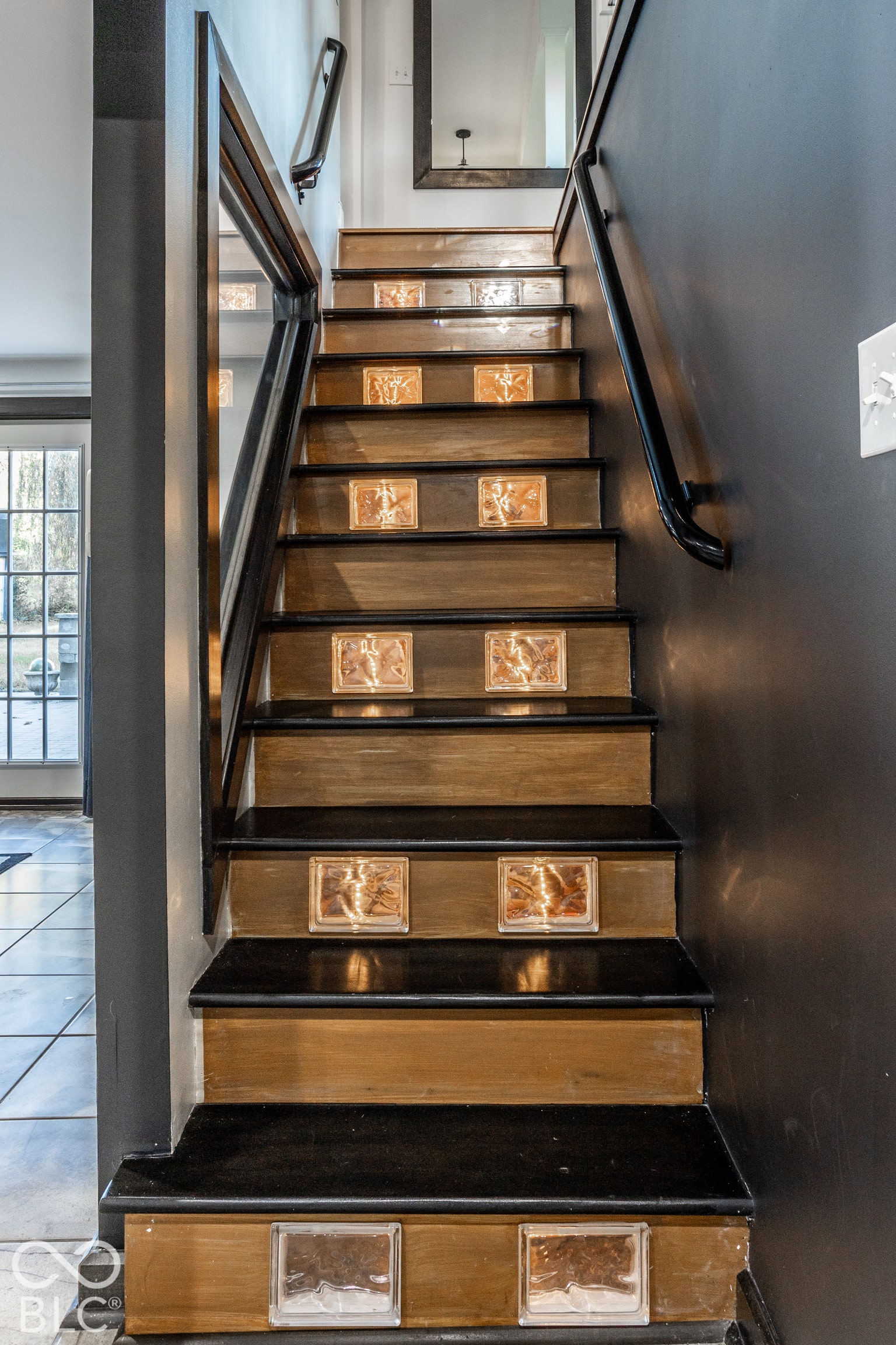 Check out the lighted stairs to the walkout finished lower level!