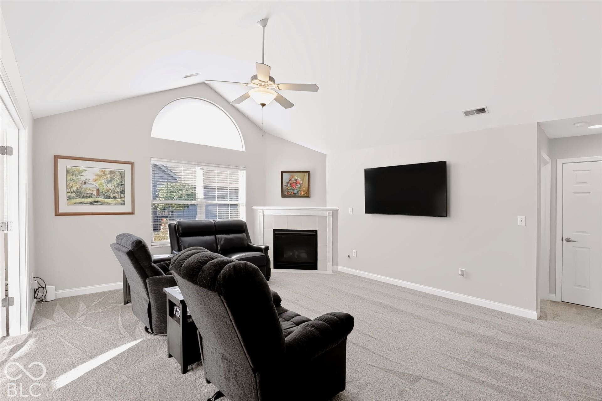 Vaulted ceiling with an arched transom window