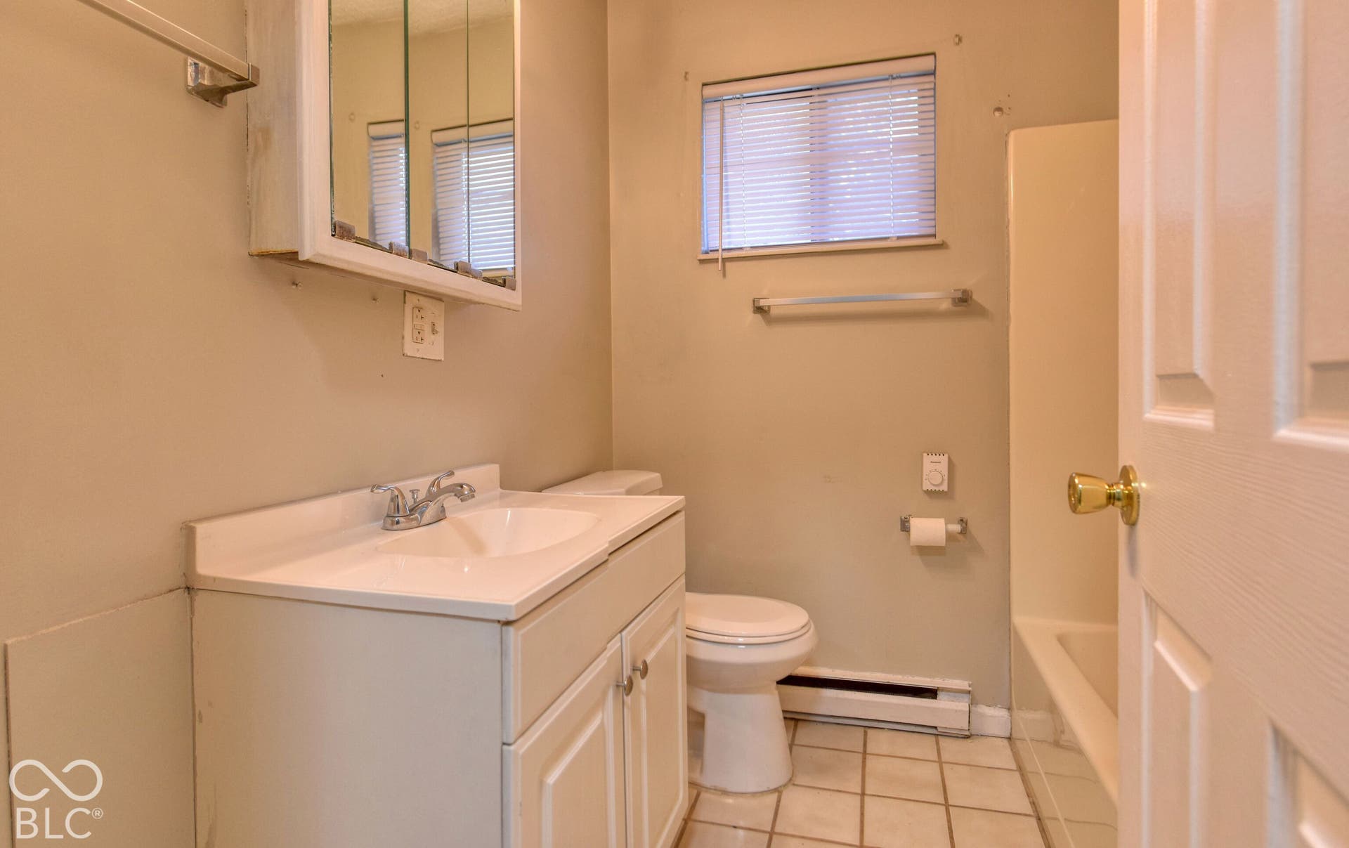 Full Bath with Tile Floors!