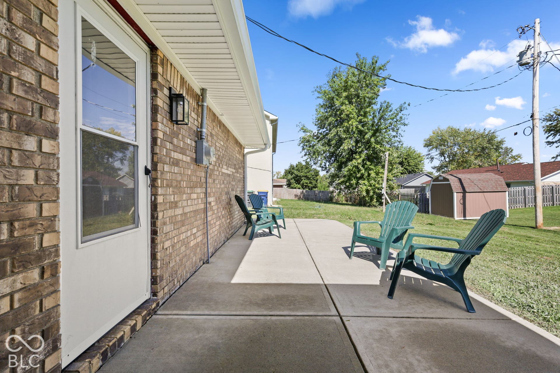 Brick exterior with a white storm door