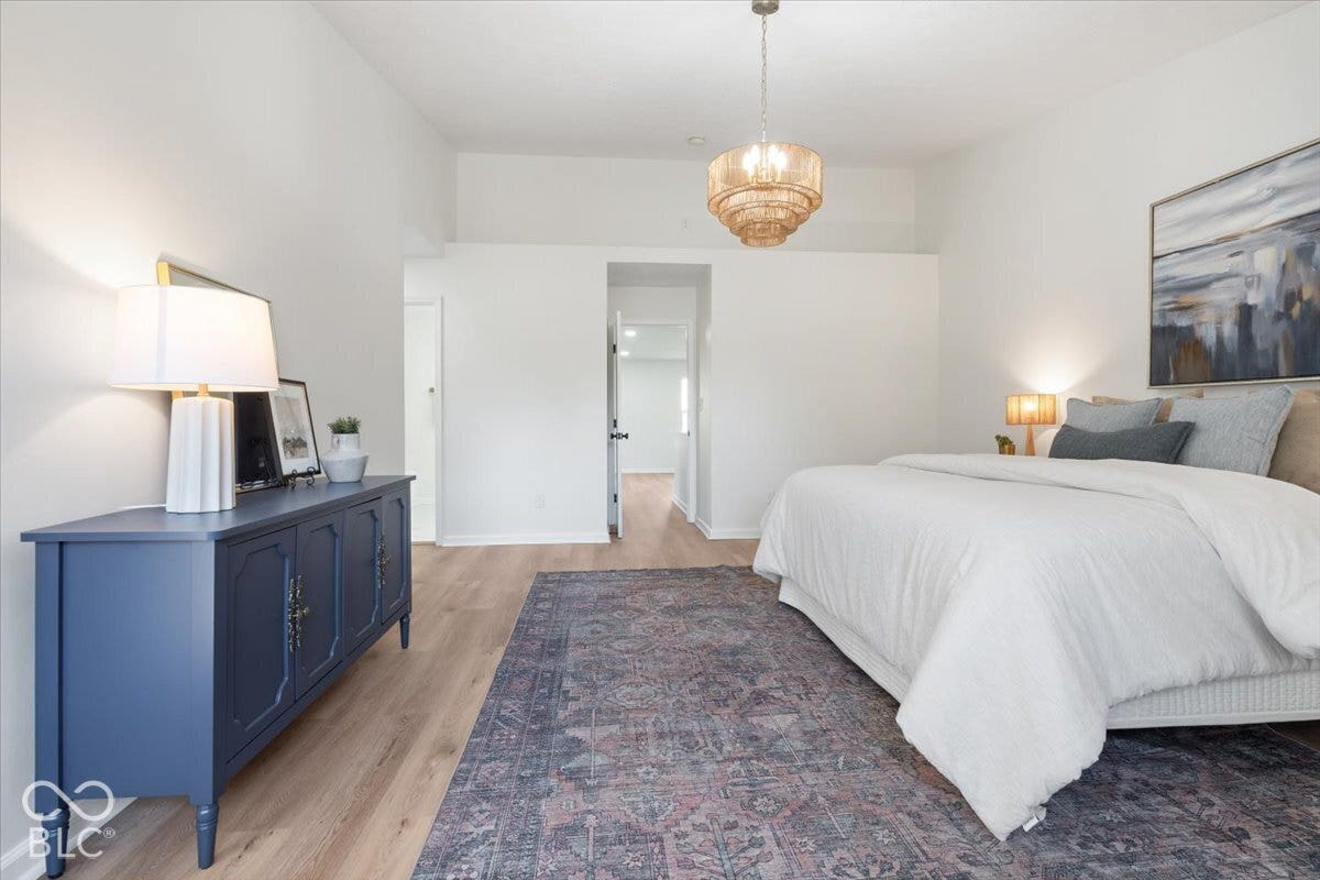 11780 Copper Mines Way, Fishers, IN 46038 Wood-finish flooring with a textured area rug