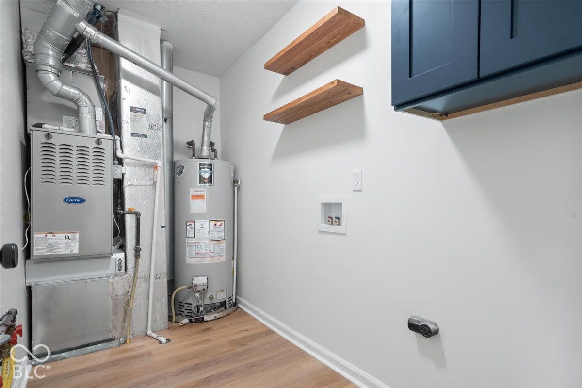 11780 Copper Mines Way, Fishers, IN 46038 Wood-finish flooring with white wall paint