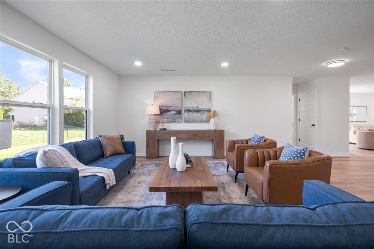 11780 Copper Mines Way, Fishers, IN 46038 Recessed lighting, light wood-finish flooring, white walls, and bright windows