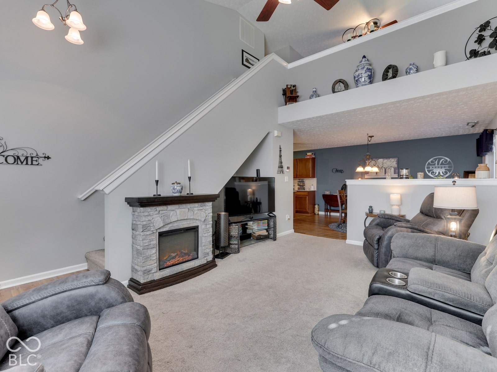 The overlooking loft gives the main living space an impressive sense of openness