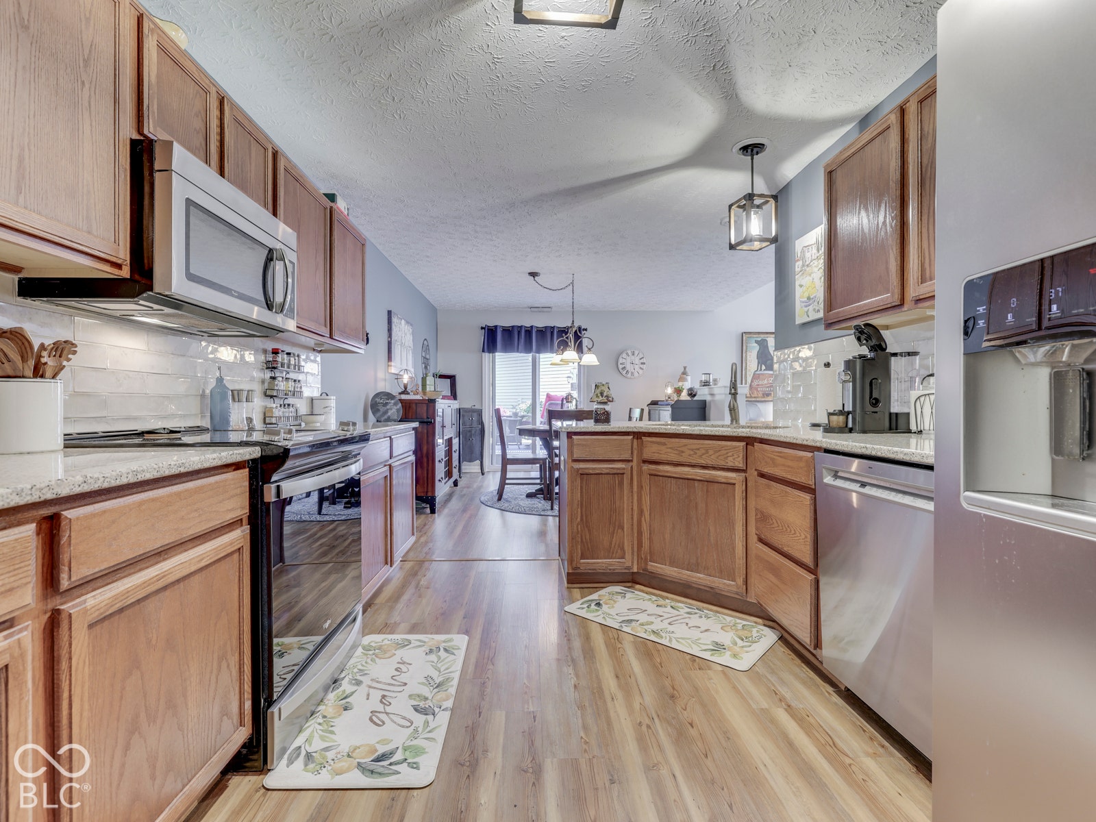 Open kitchen keeps you connected to the main dining and living spaces.