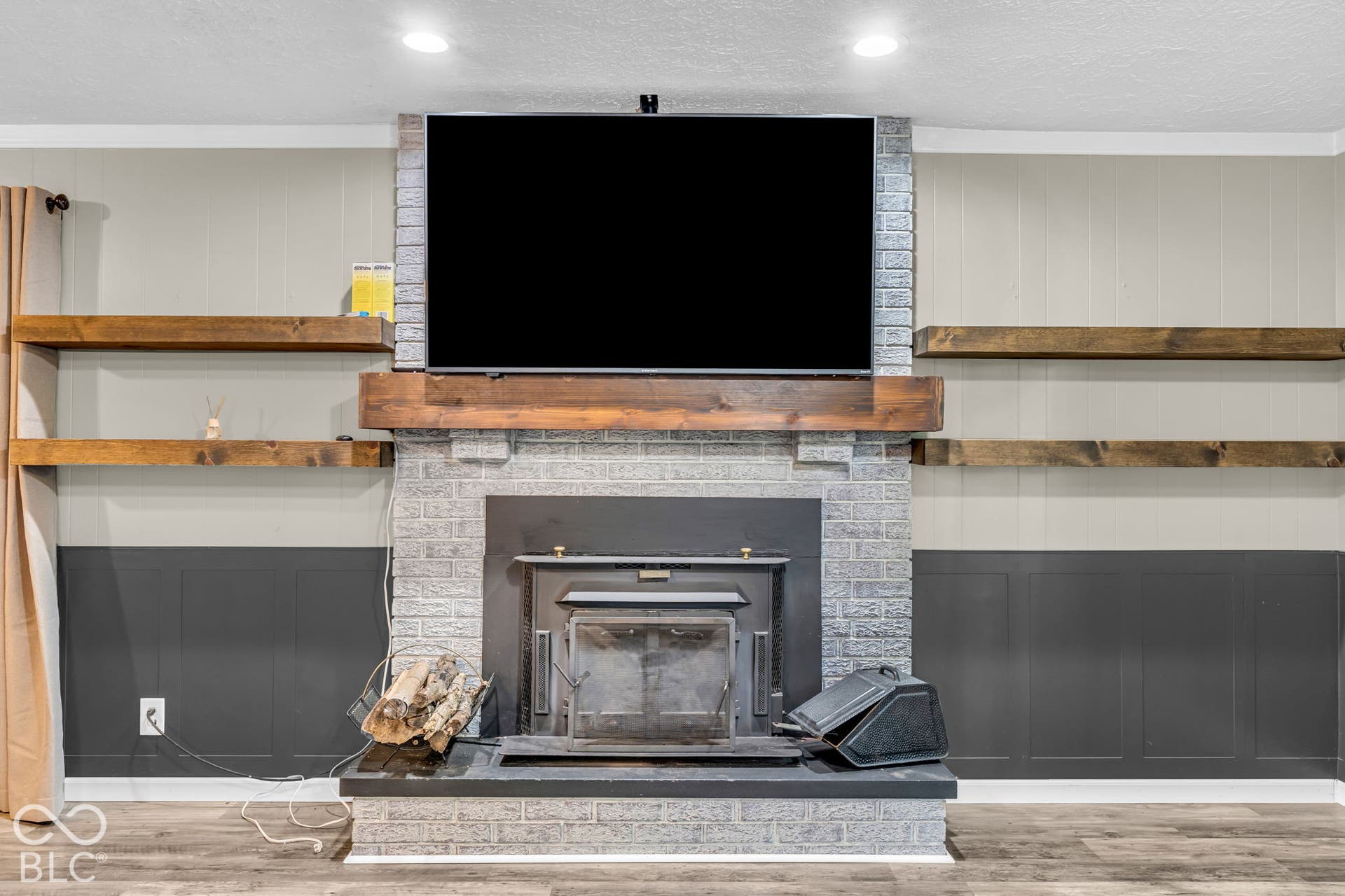Brick-clad fireplace with a wood-burning insert