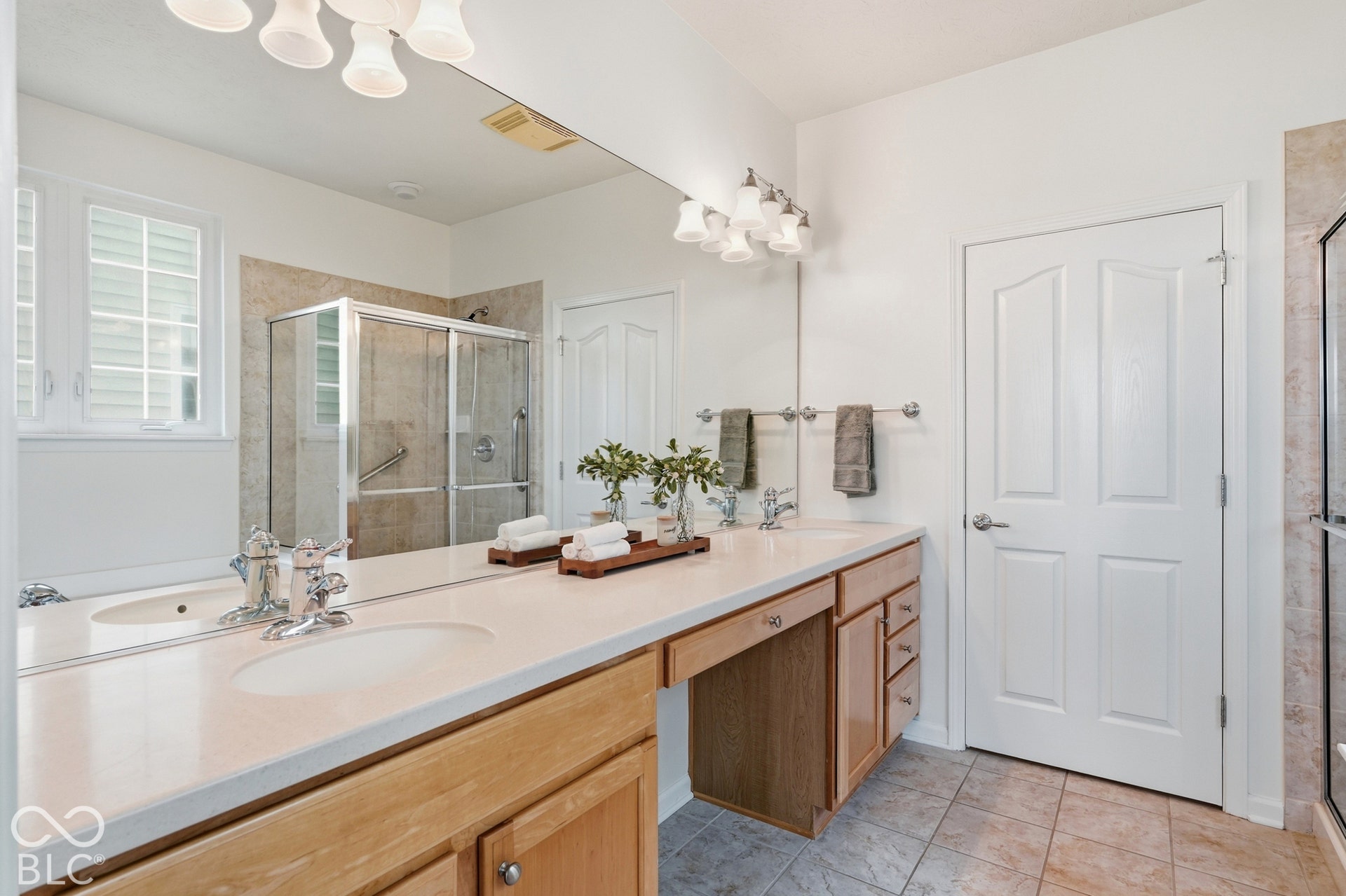 The roomy primary bathroom has a separate shower, bath & WC.
