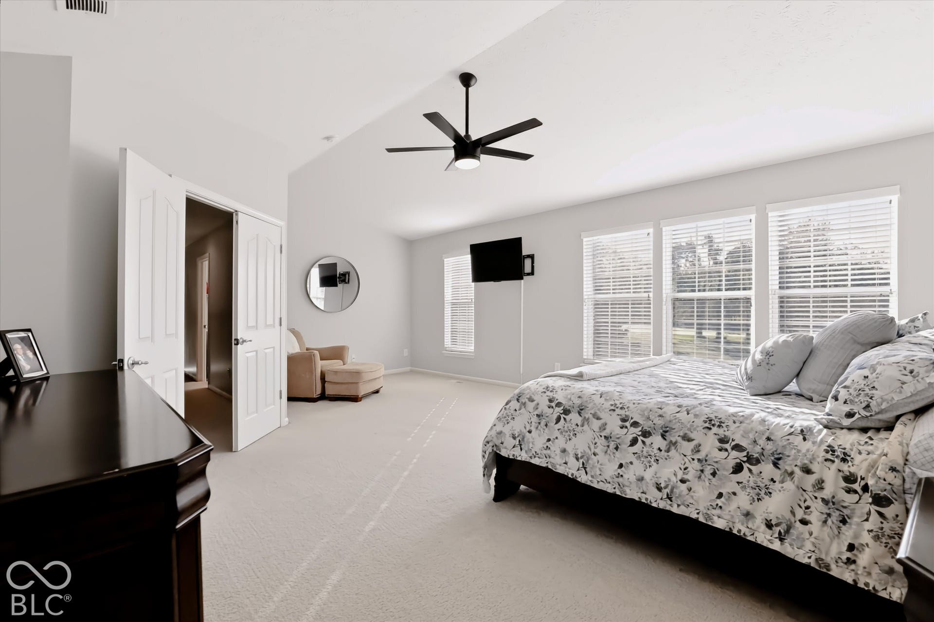 Large primary bedroom with sitting area & recently renovated primary bath (2025)