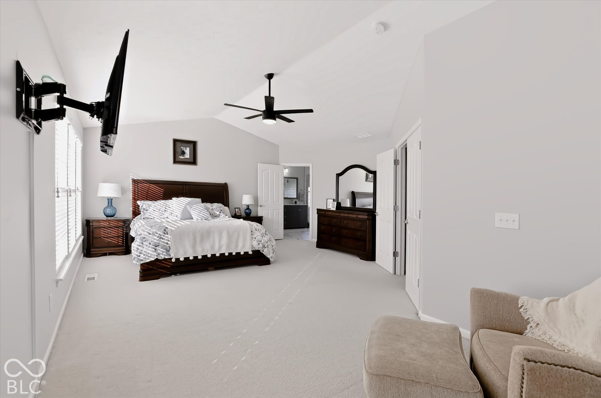 Large primary bedroom with sitting area & recently renovated primary bath (2025)