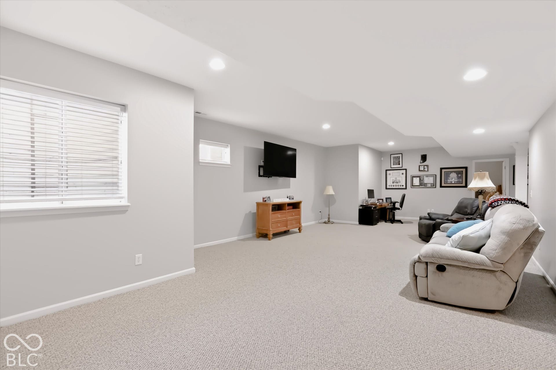 This massive finished basement has space for everything - exercise room, living room, storage, 6th bedroom, & full bath