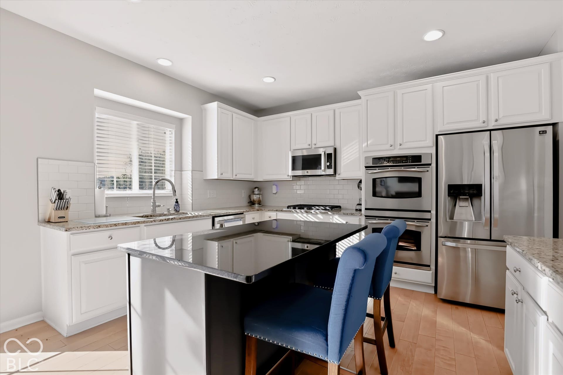 Clean, modern, with update appliances - a double oven makes entertaining easy!