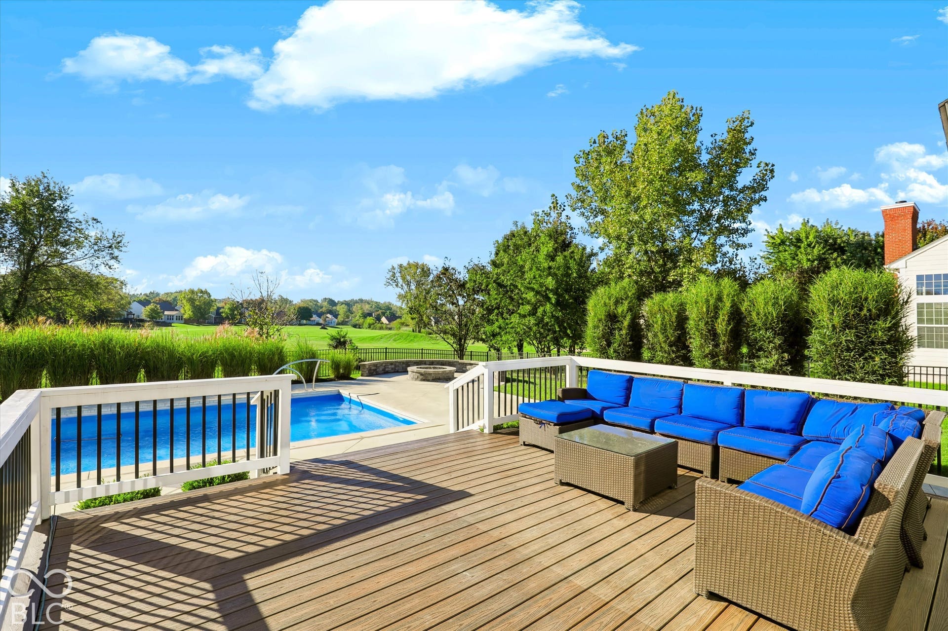 This home sits on the 11th Hole at Gray Eagle - complete with Trex deck, saltwater pool, a firepit, lush landscaping and more. It's quite the retreat!