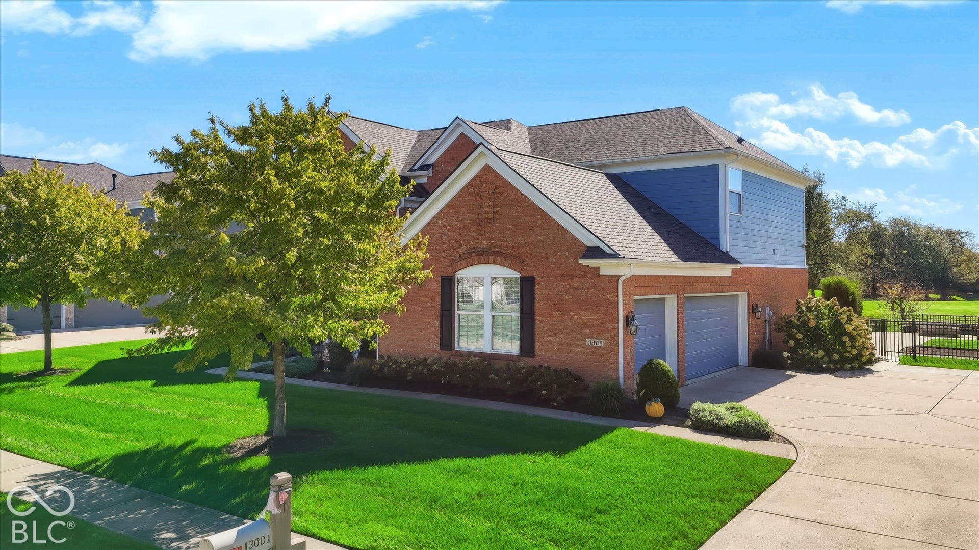 Oversized 3 car garage with basketball hoop