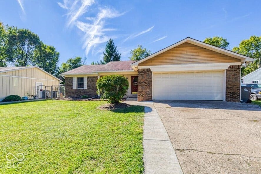 2 car attached garage and driveway.