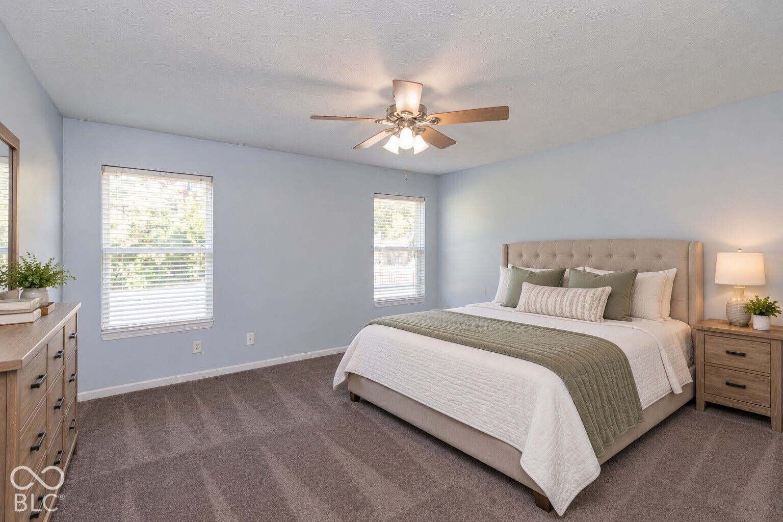 primary bedroom virtually staged with furniture