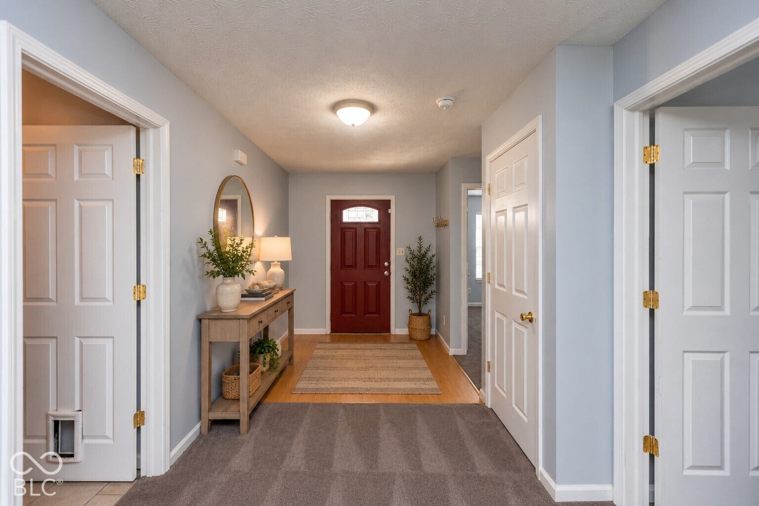 Entry virtually staged with furniture