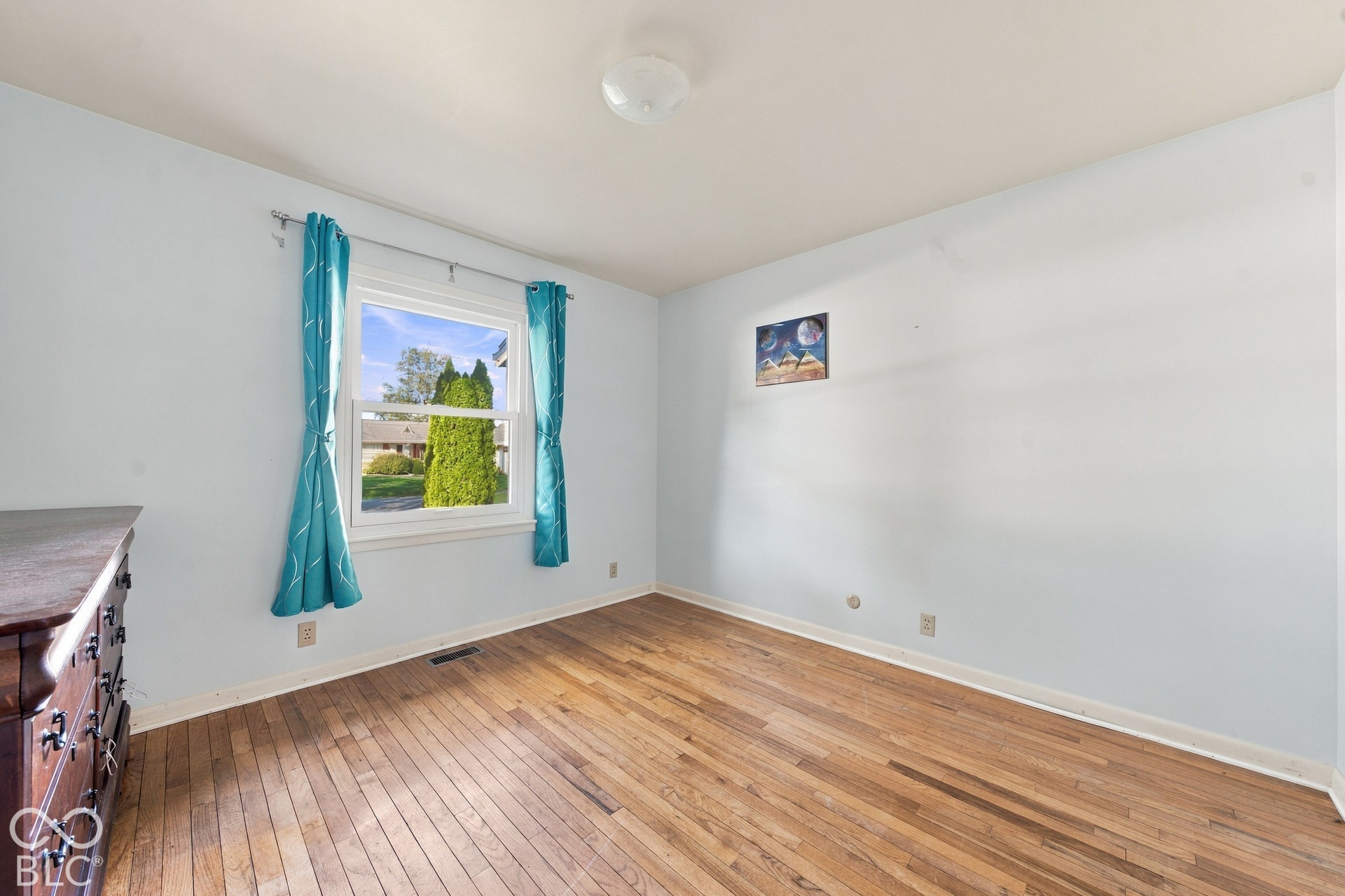 Wood-finish flooring with a white trim