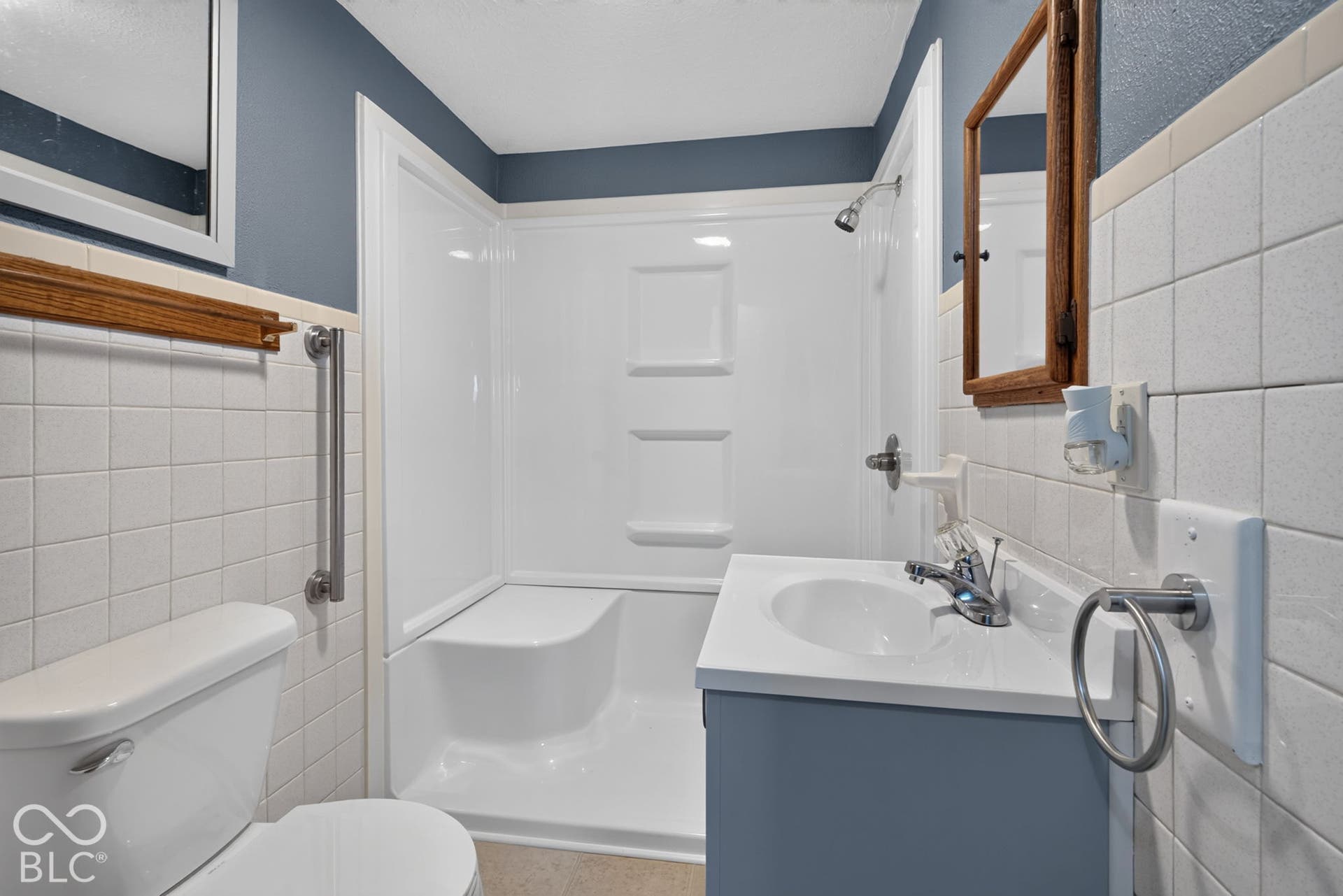 Bathroom features a walk-in shower