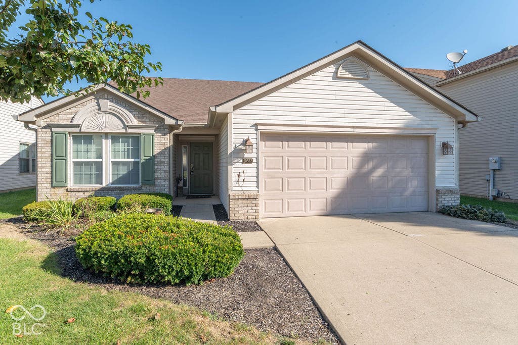Well maintained, Brick and siding ranch home, with a two-car garage.