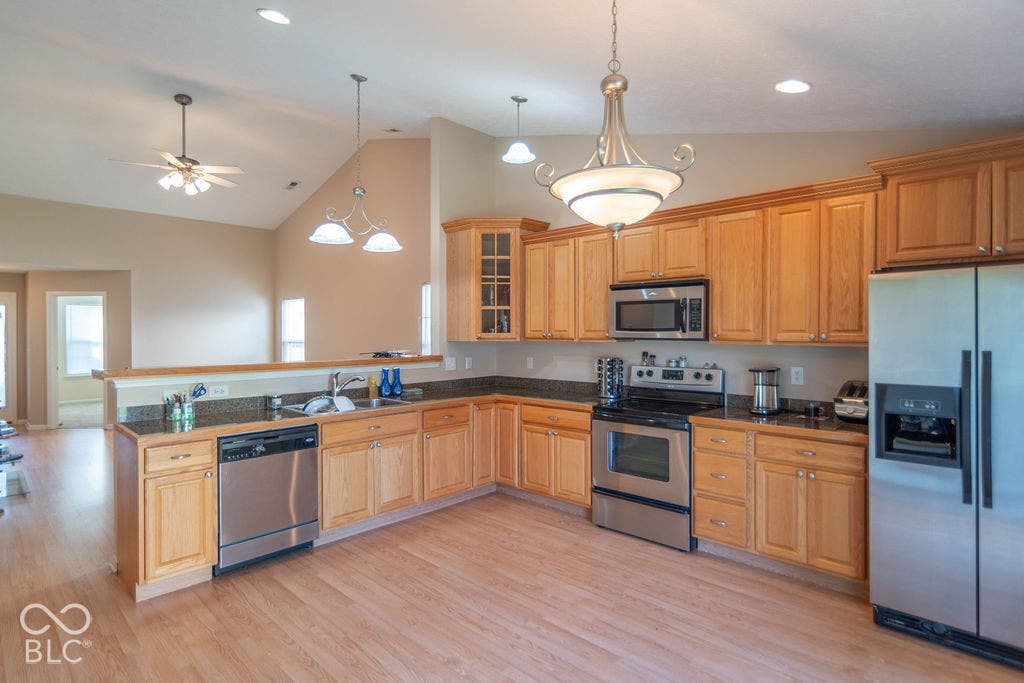 Eat-in kitchen, with appliances.