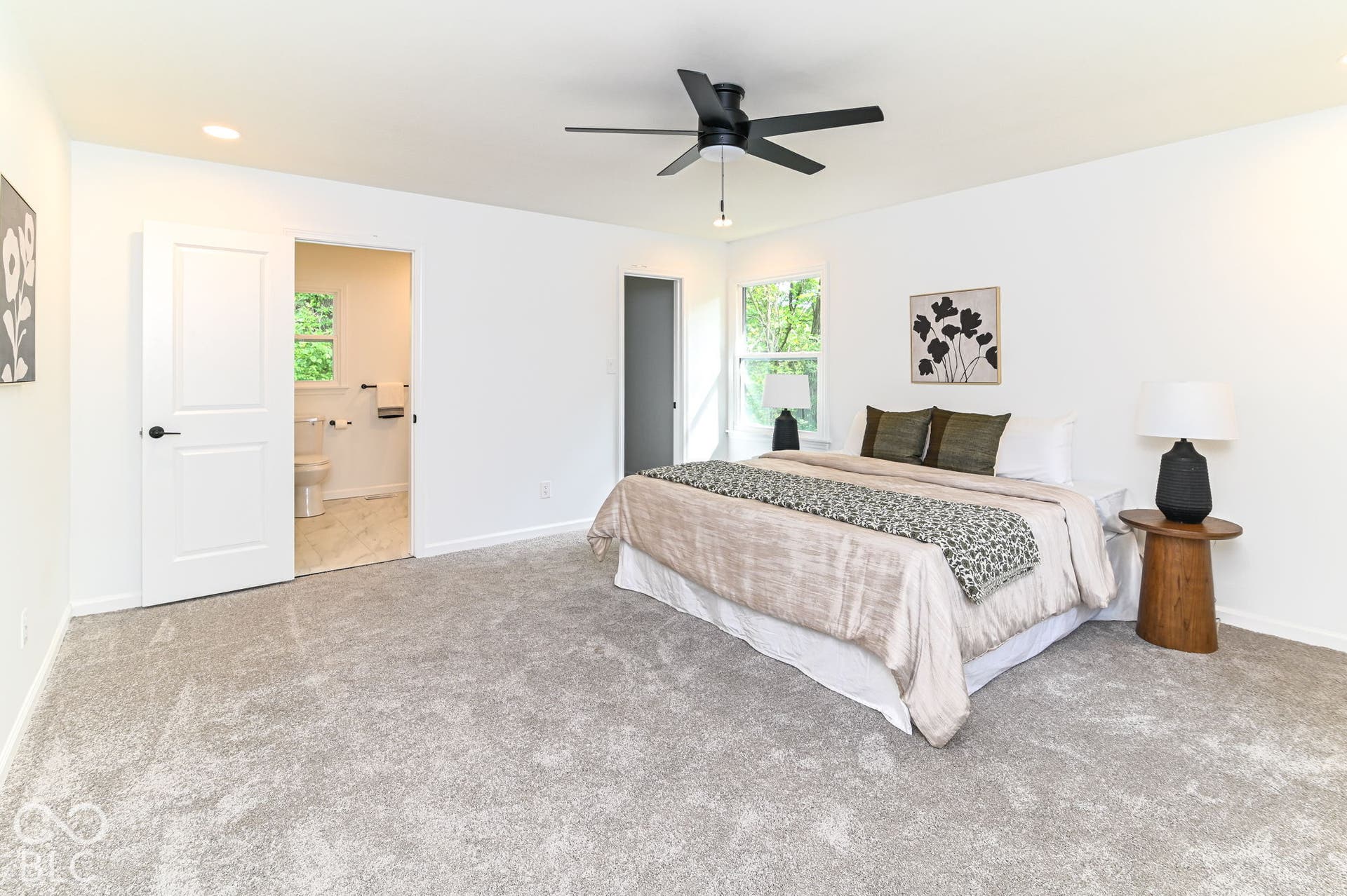 Carpeted flooring with recessed lighting and a ceiling fan