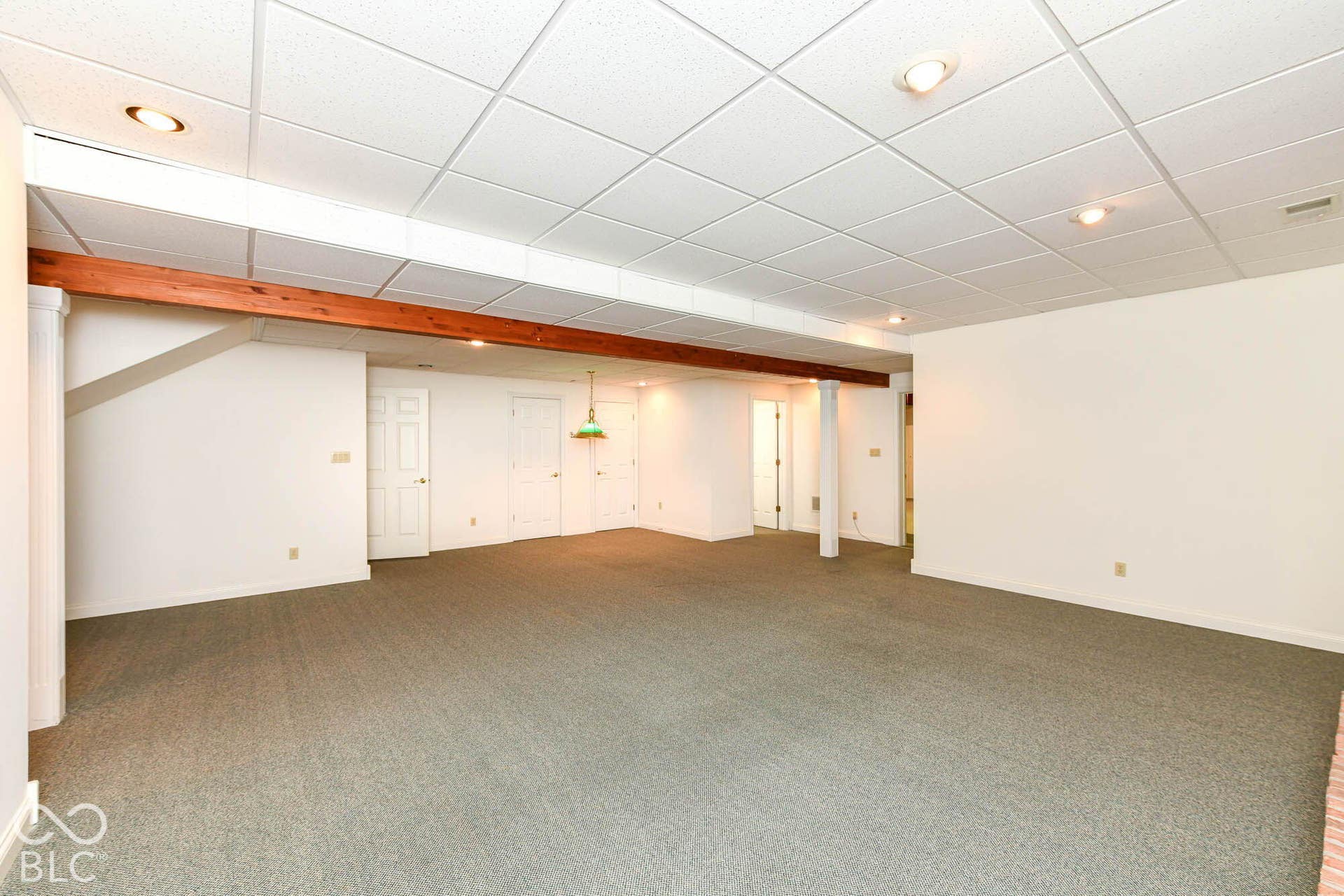 6431 Shamel Drive, Indianapolis, IN 46278 Basement Rec Room. Expansive carpeted area with recessed lighting and a drop ceiling