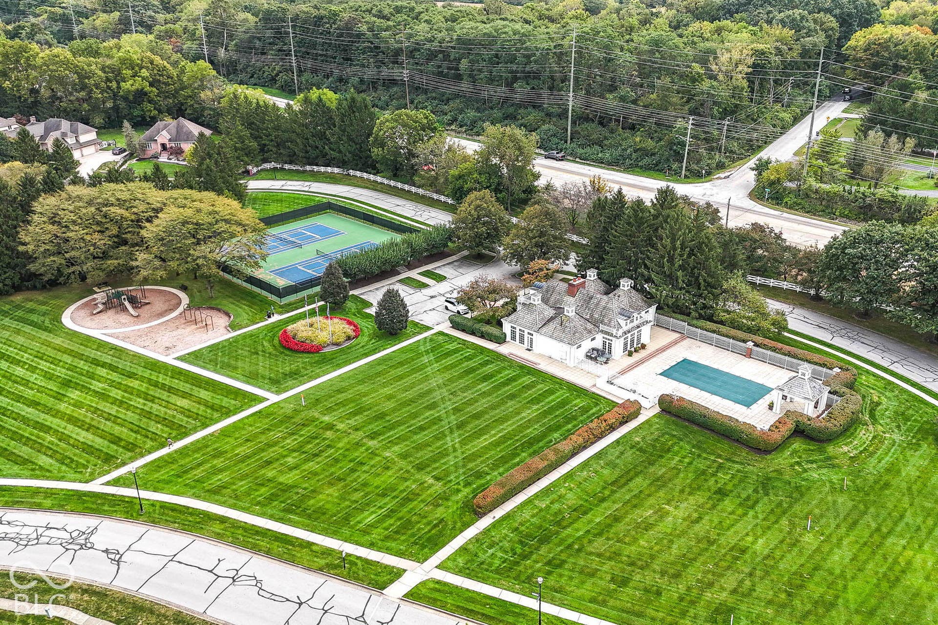6431 Shamel Drive, Indianapolis, IN 46278 Aerial view of nearby expansive green space with clubhouse, tennis courts and swimming pool