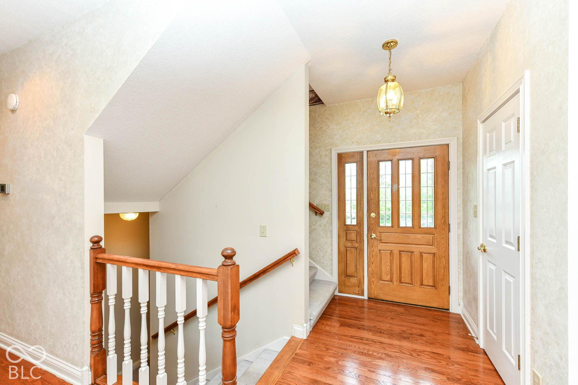 6431 Shamel Drive, Indianapolis, IN 46278 Hardwood flooring in the entryway