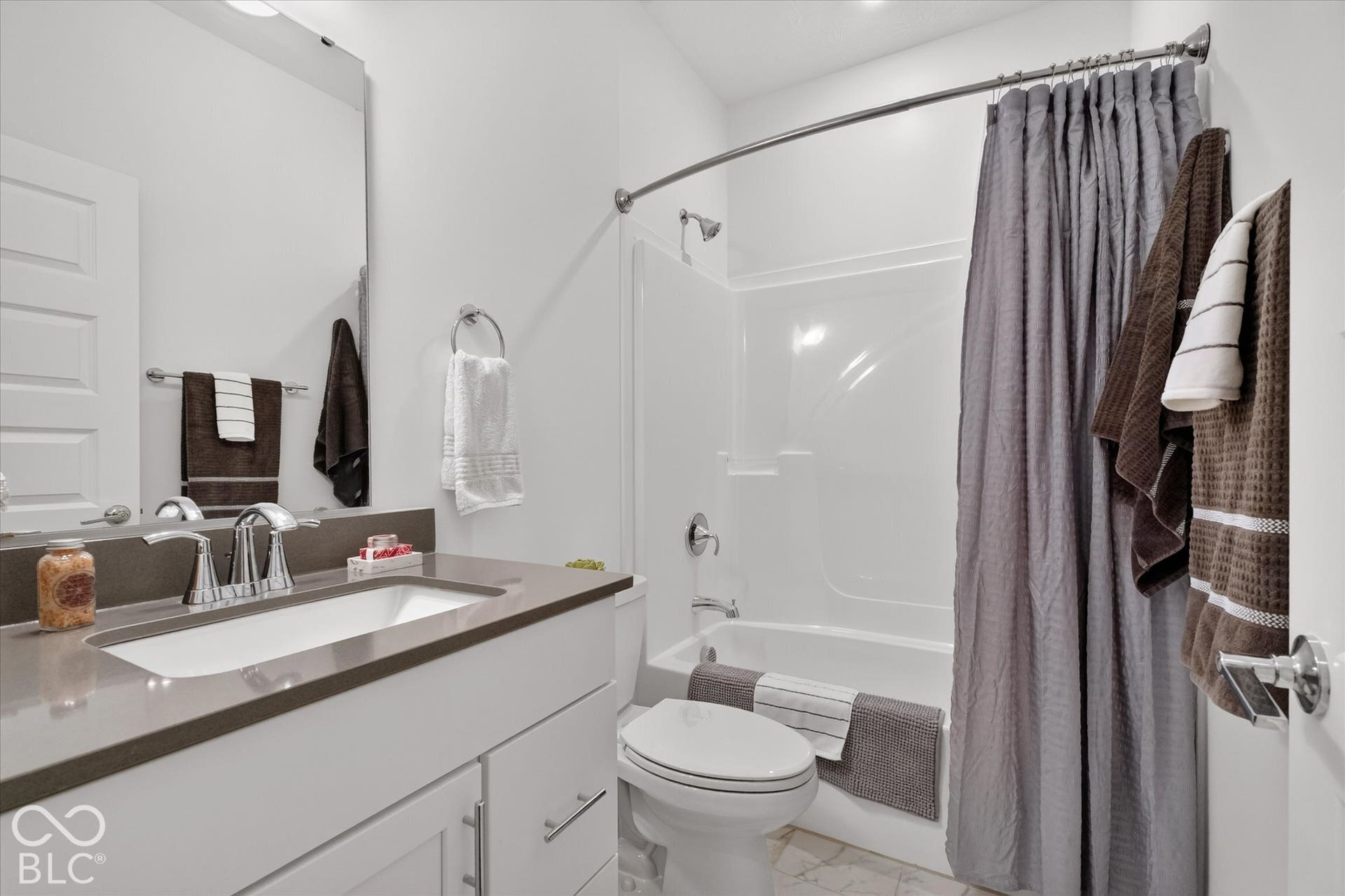1405 Lake Haven Lane, Westfield, IN 46074 Vanity with an integrated sink, polished chrome faucet, and substantial countertop space