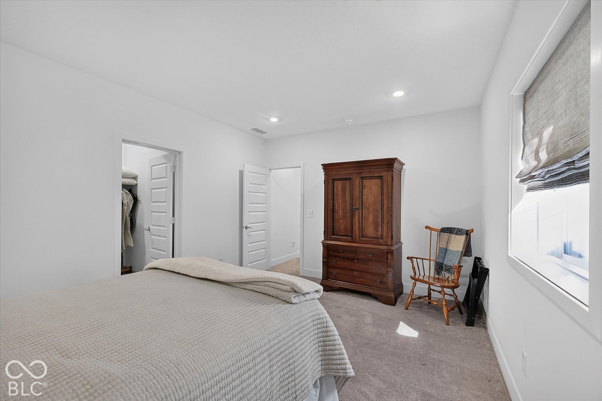 1405 Lake Haven Lane, Westfield, IN 46074 Recessed lighting illuminates the carpeted flooring and white walls
