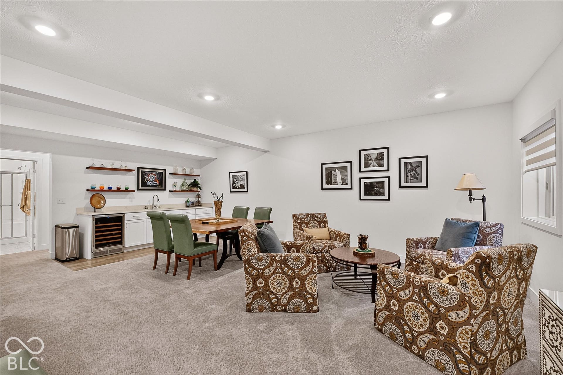 1405 Lake Haven Lane, Westfield, IN 46074 Recessed lighting illuminates this carpeted room featuring a built-in wet bar with a stainless steel sink and under-counter beverage refrigerator