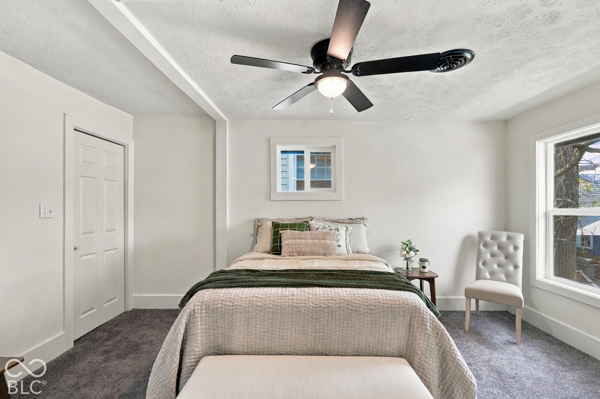 Primary bedroom (upper level) with walk-in closet and ensuite full bath (bedroom 4)