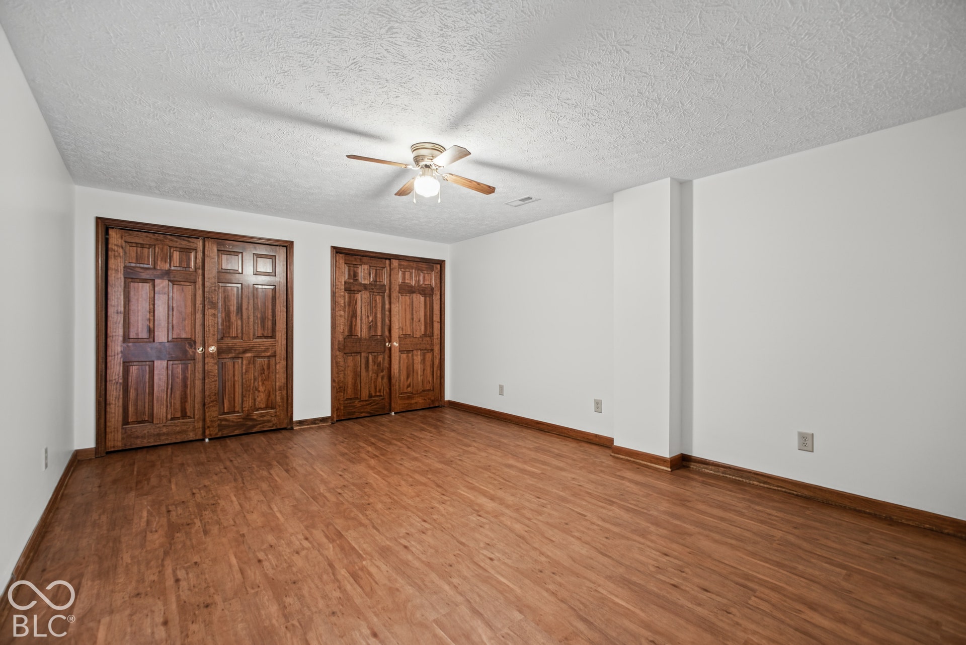 This bedroom is in the finished basement, there is not a window in this room, but is egress out of the finished walk-out basement in 2 other locations.