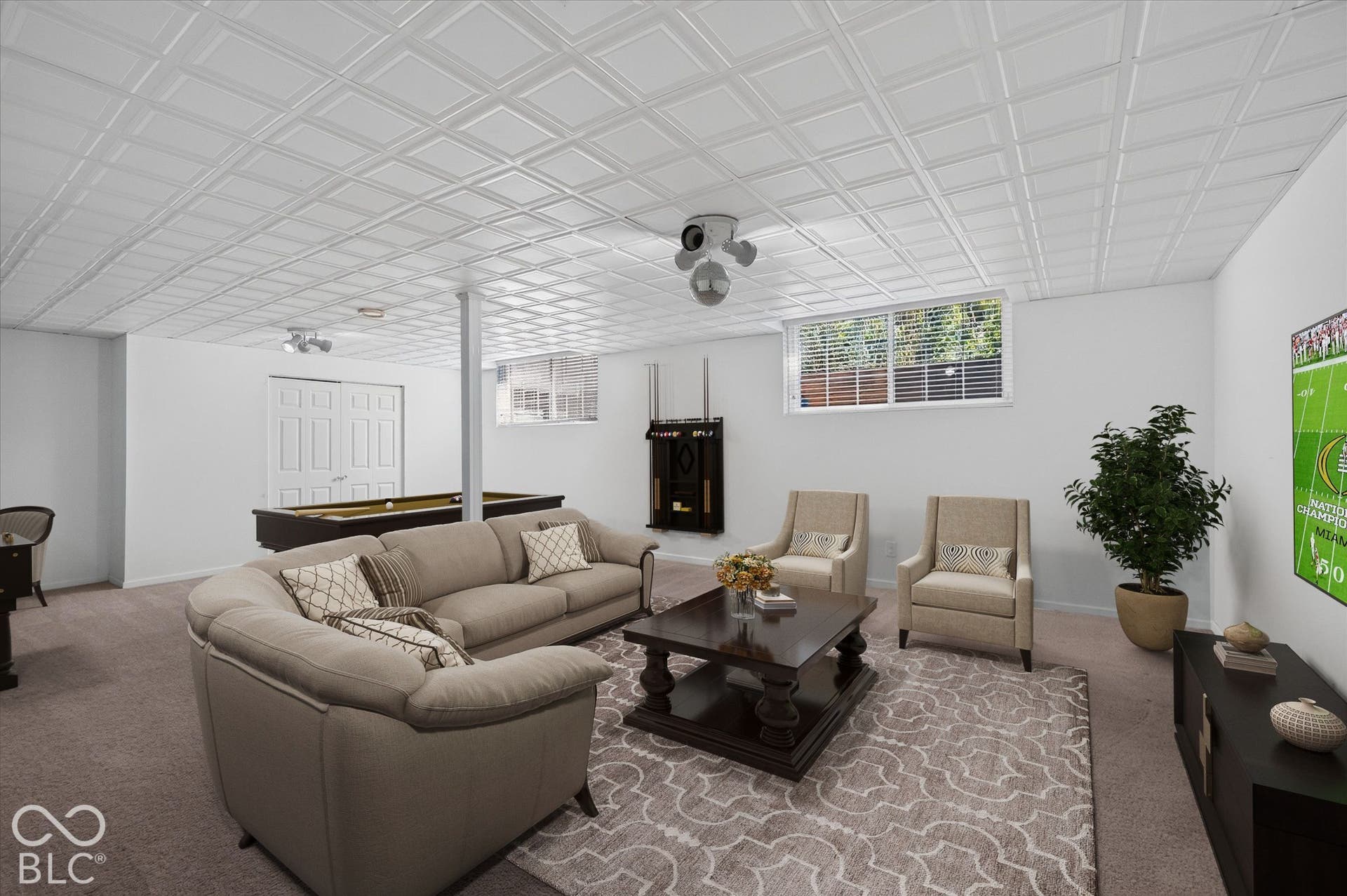 Virtually Altered - Recessed panel ceiling, white interior walls, carpeted flooring, built-in window blinds, and white bi-fold doors
