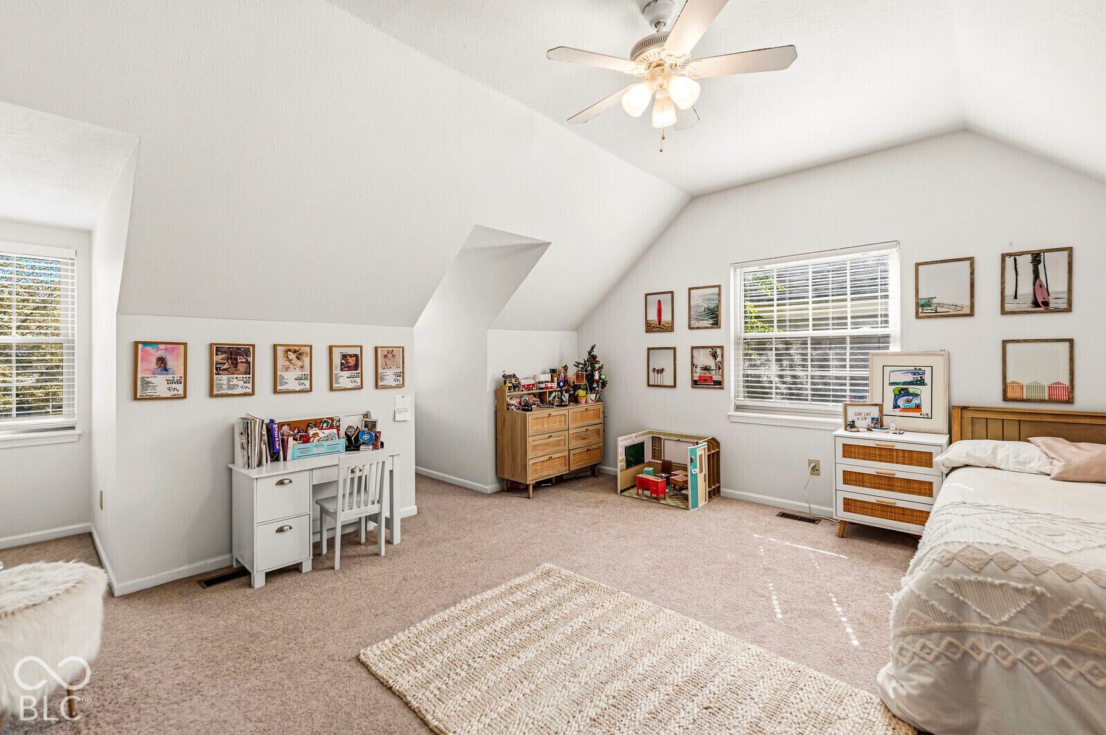 Huge Bedroom 4 with vaulted ceiling and a ceiling fan.