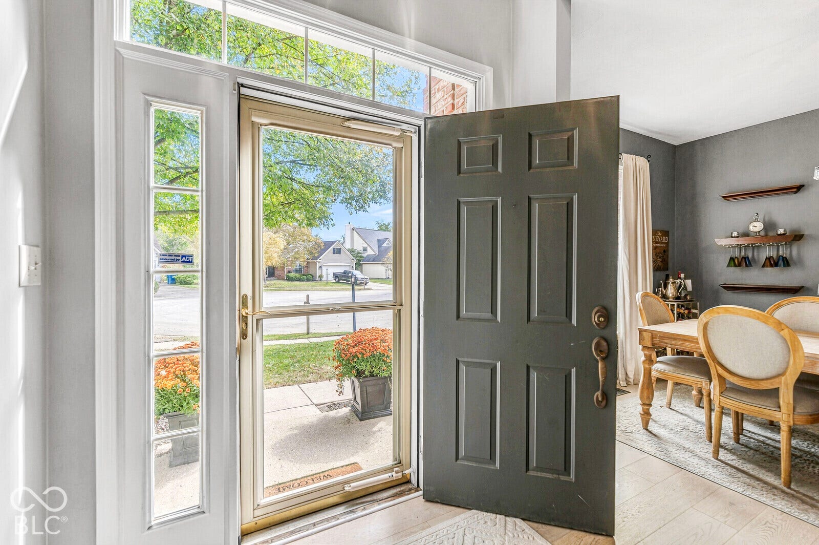 Entry with sidelight windows and transom window