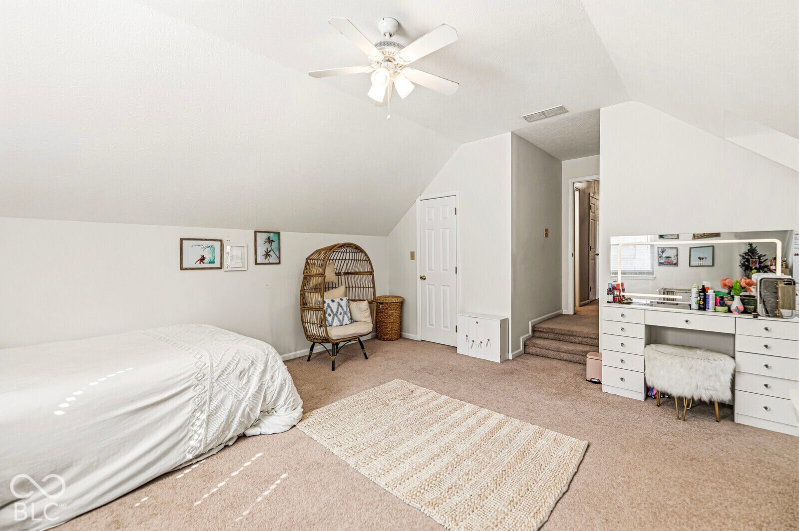 Huge Bedroom 4 with vaulted ceiling and a ceiling fan.
