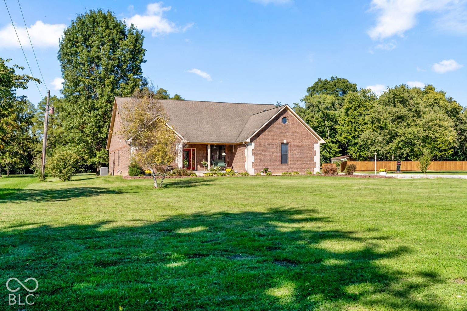 Brick exterior with stone accents and a covered front porch