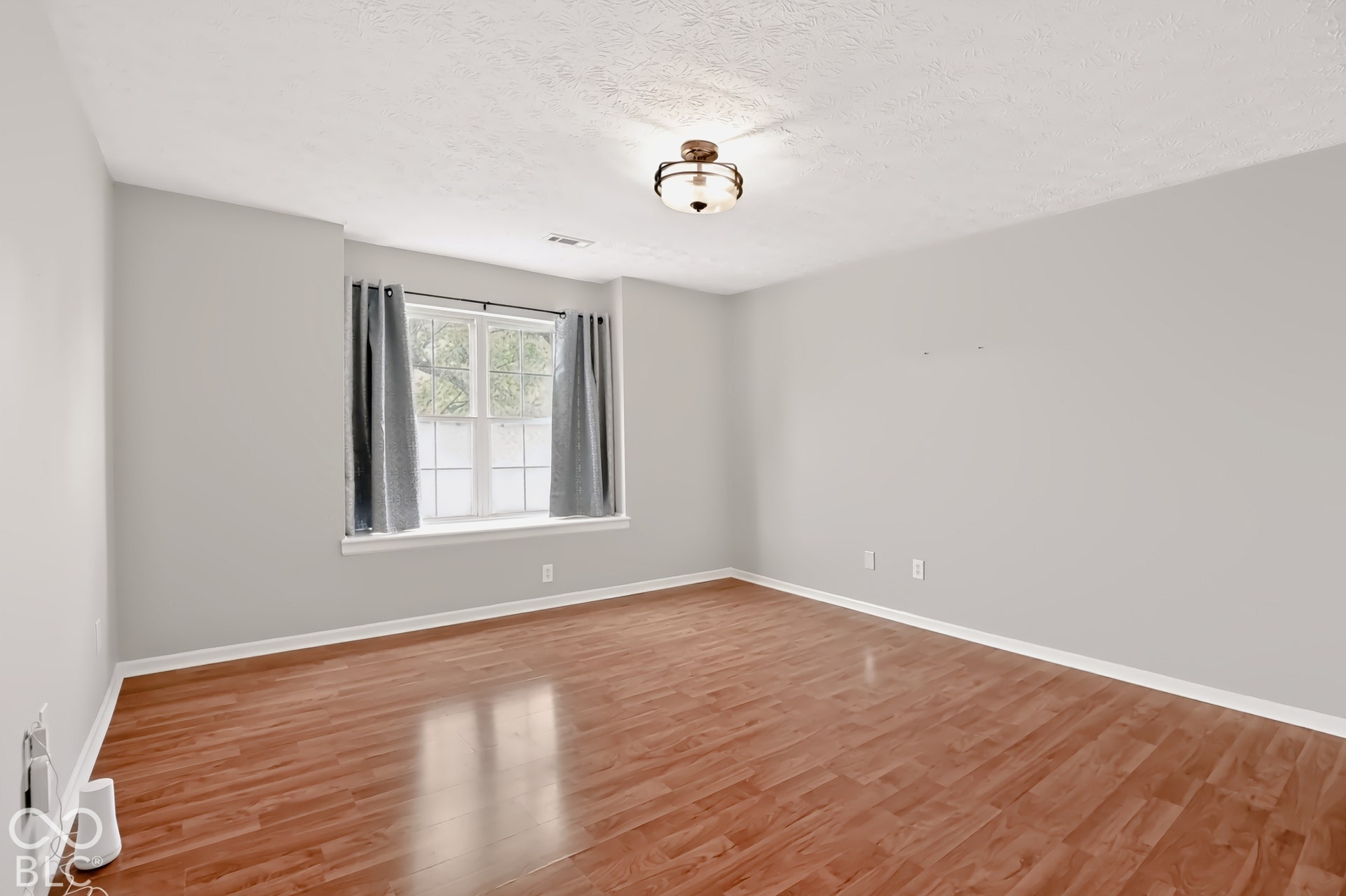 Wood-finish flooring with white trim