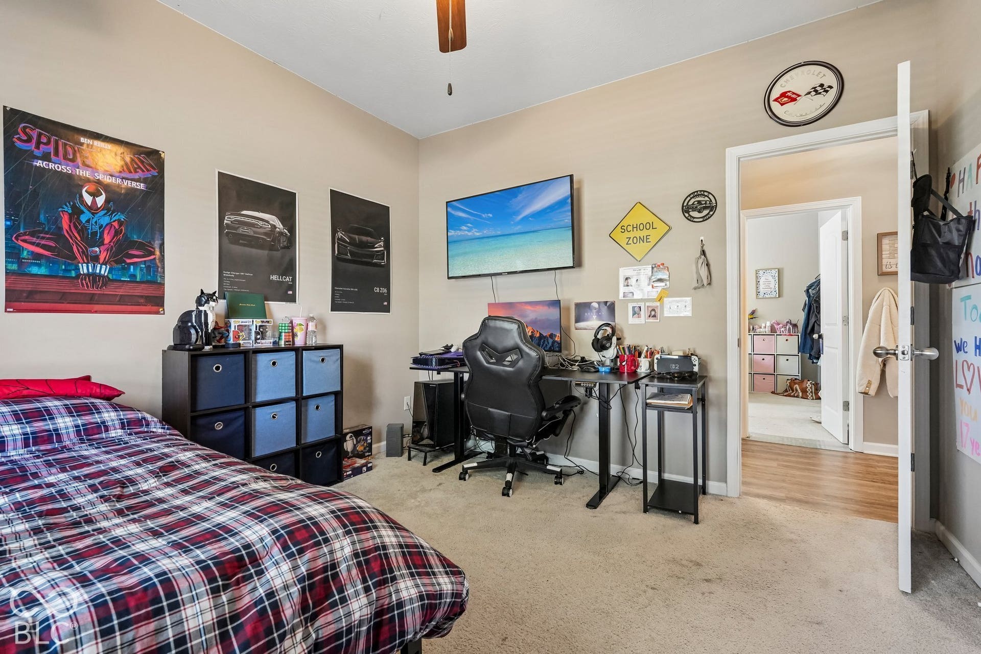 2945 W Calimanco Lane, Monrovia, IN 46157 Neutral tone wall paint, light-colored carpet flooring, ceiling fan with integrated lighting, and a white interior door