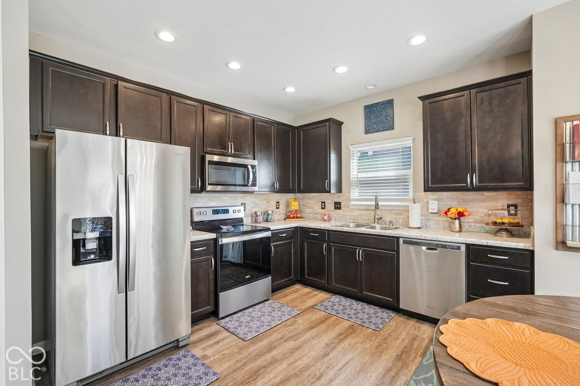 2945 W Calimanco Lane, Monrovia, IN 46157 Kitchen featuring dark wood-finish cabinetry, stainless steel appliances, recessed lighting, and wood-finish flooring