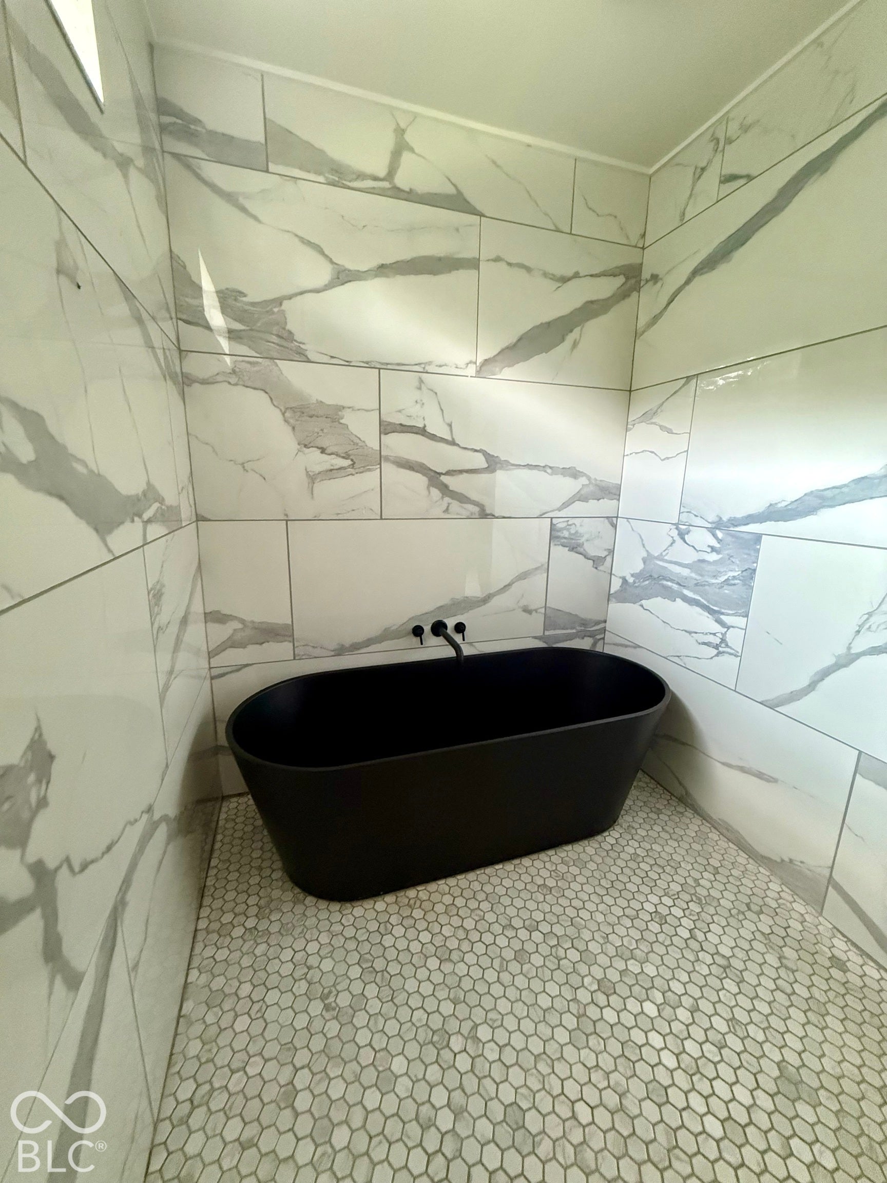 Freestanding tub in huge walk in shower