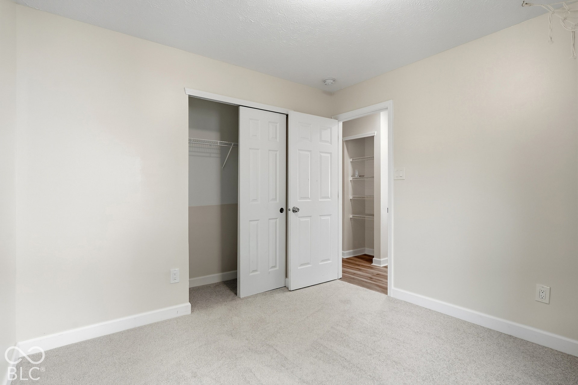 Neutral wall color with white trim