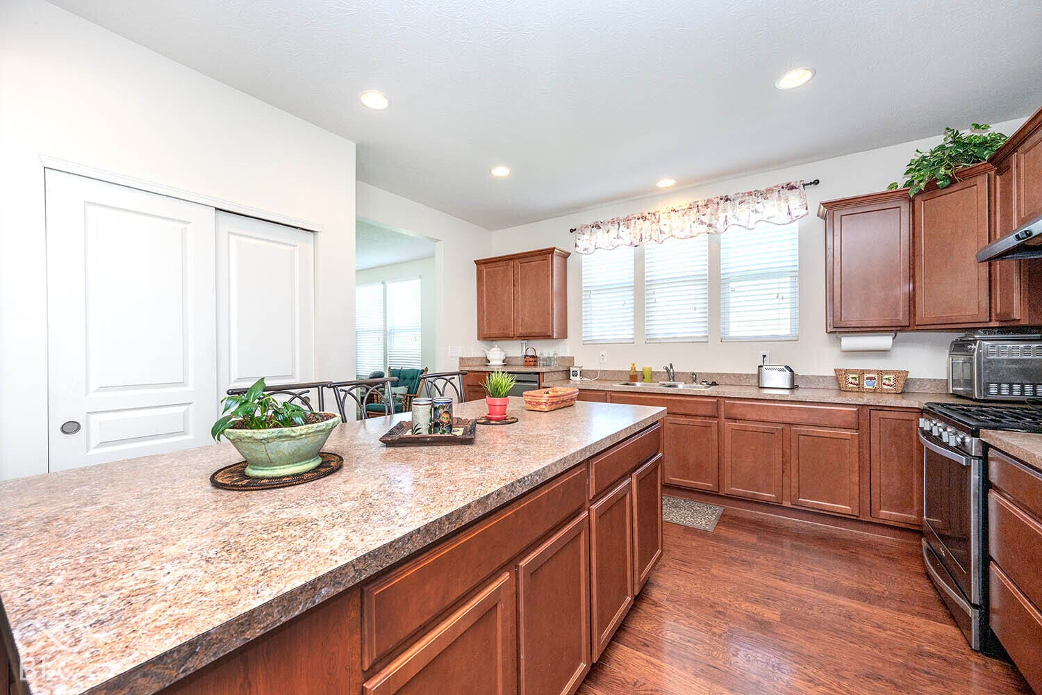 Note the huge center island. All kitchen appliances, including the gas range/oven and refrigerator stay with the home!