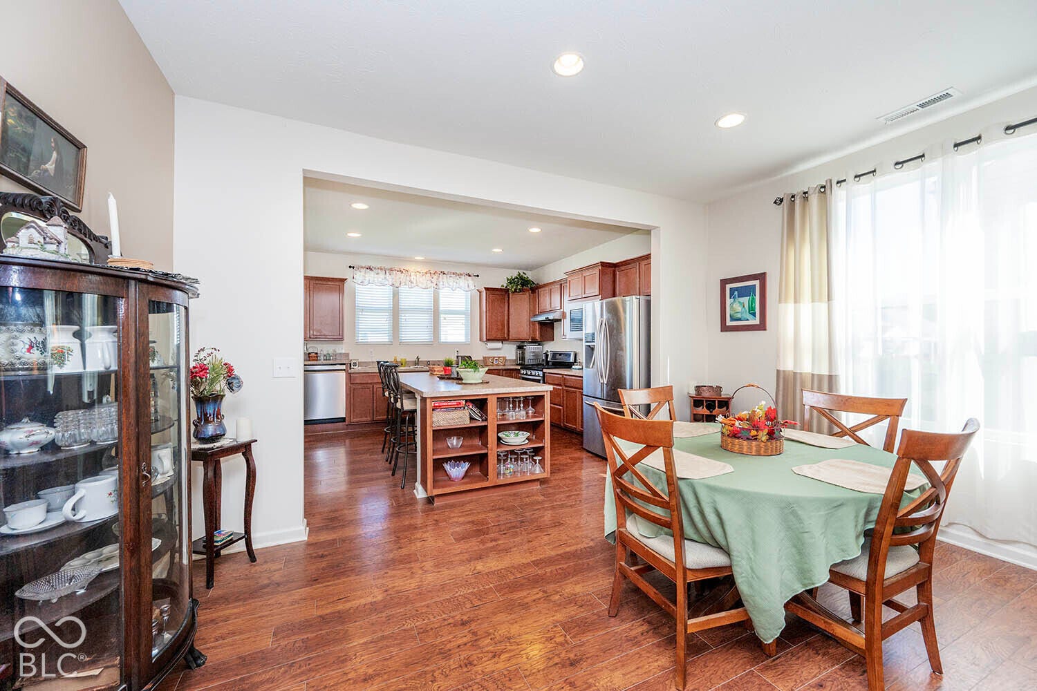 The Dining Area measures 15' by 9' and sits between the Great Room and the Kitchen.