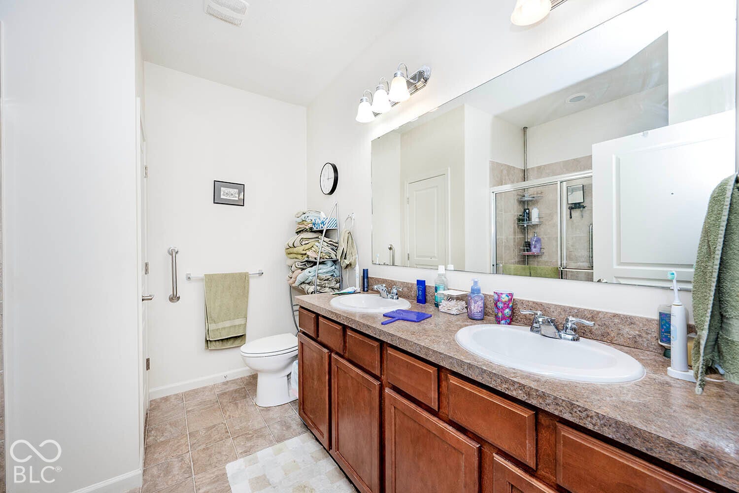 The primary bathroom features double sinks