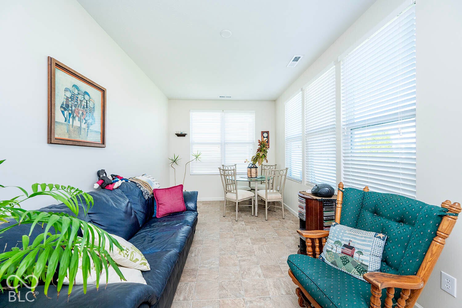 The 18' by 10' sunroom has plenty of windows and can serve multiple purposes, including an exercise area, another living area, or a tv room.